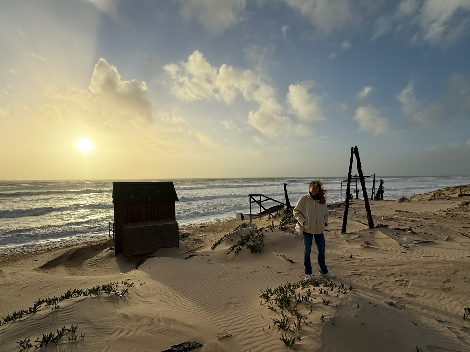 Windswept dunes and Atlantic surf in winter light
