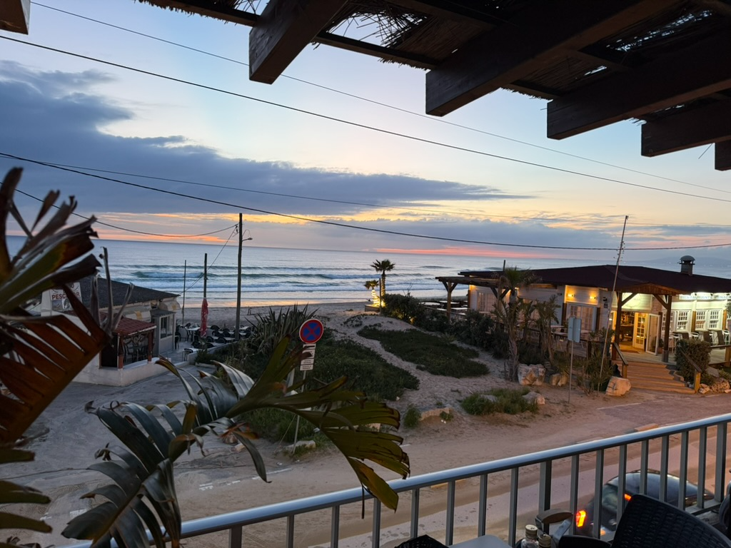 Fonte da Telha beachfront restaurants at dusk