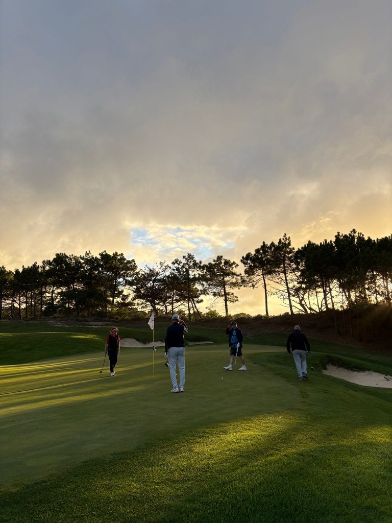 Golf green at sunset