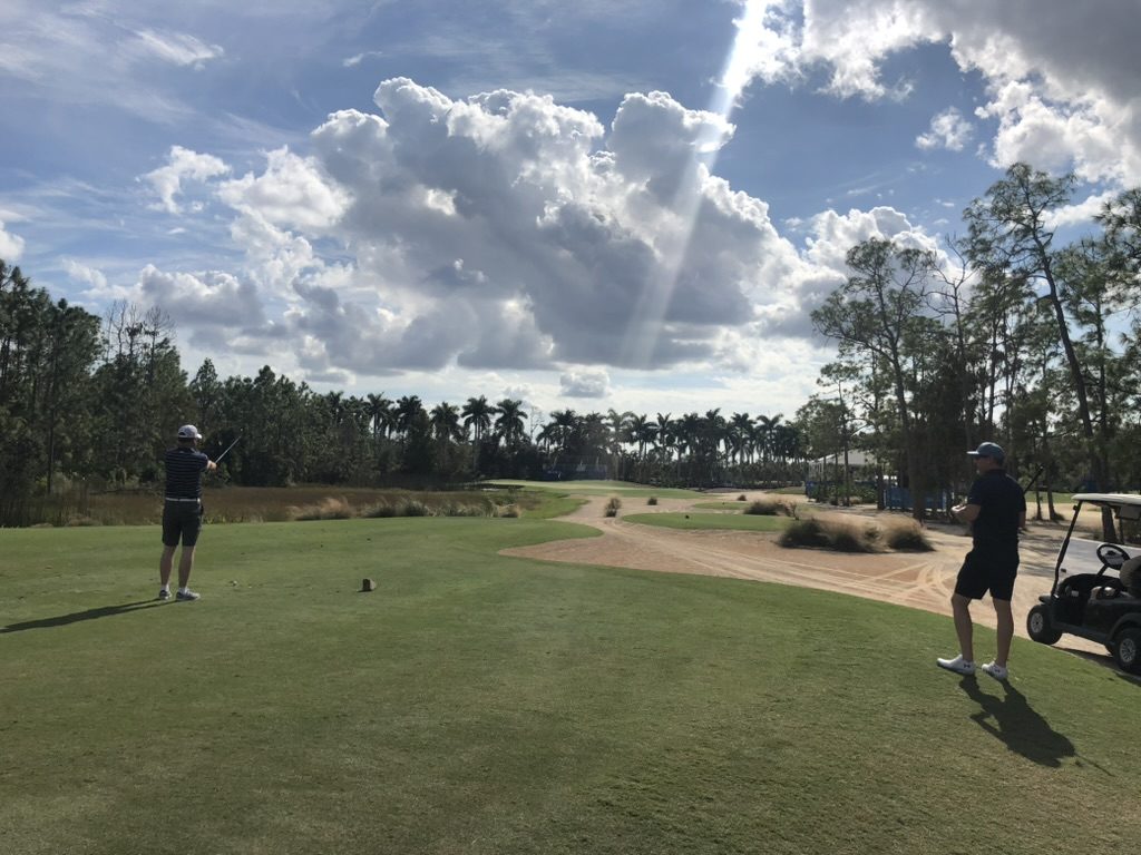 Tee off under big clouds