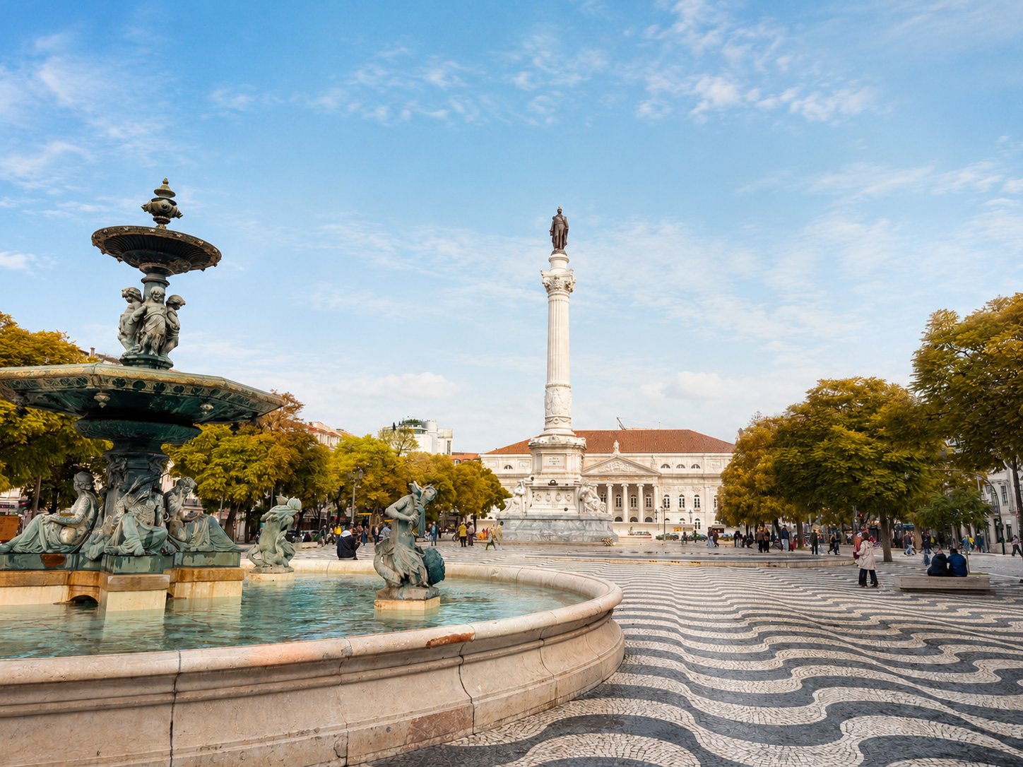 Rossio square with fountain and column in central Lisbon