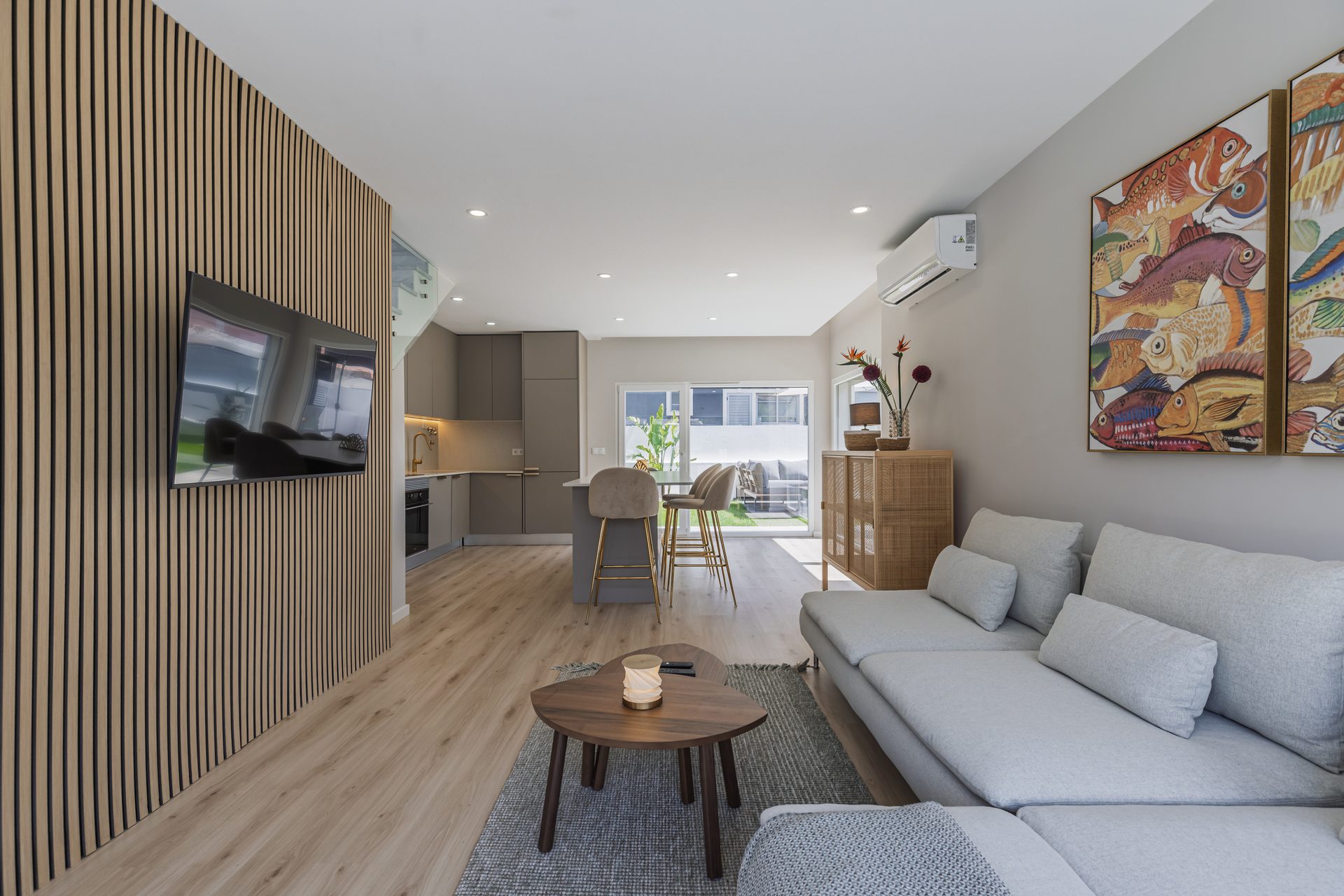 Bright open-plan living and dining area with kitchen island